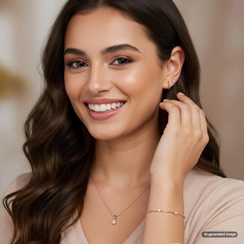 A stunning collection of rose gold jewelry featuring rings, necklaces, and bracelets.