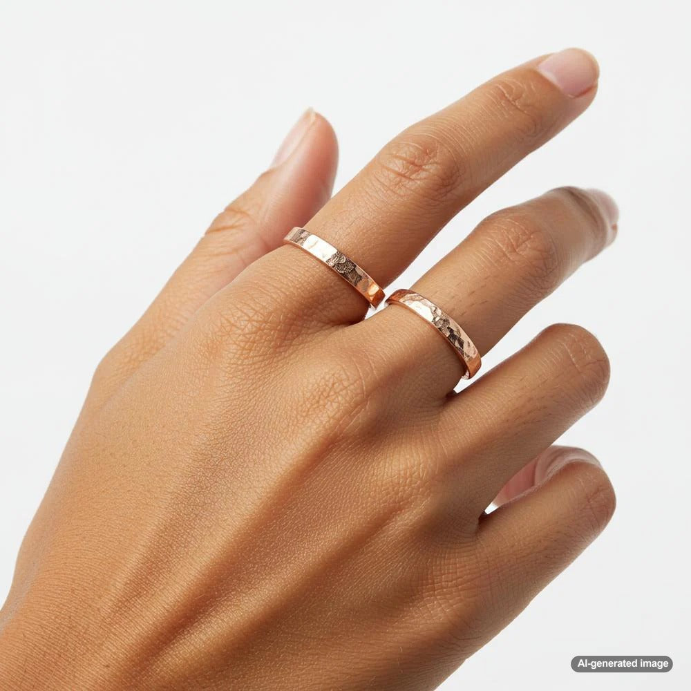 A beautiful rose gold ring set against a soft neutral background