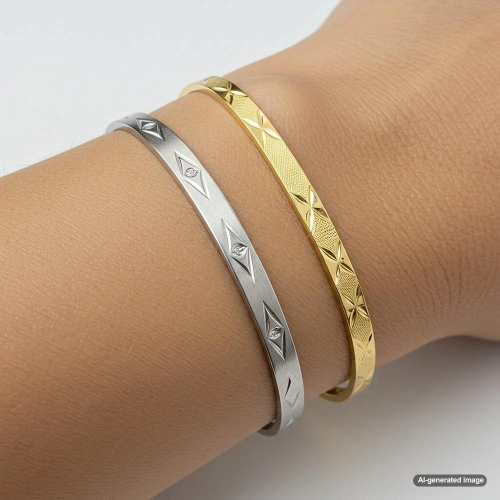 Yellow gold and white gold rings side by side, showcasing the difference in color and style