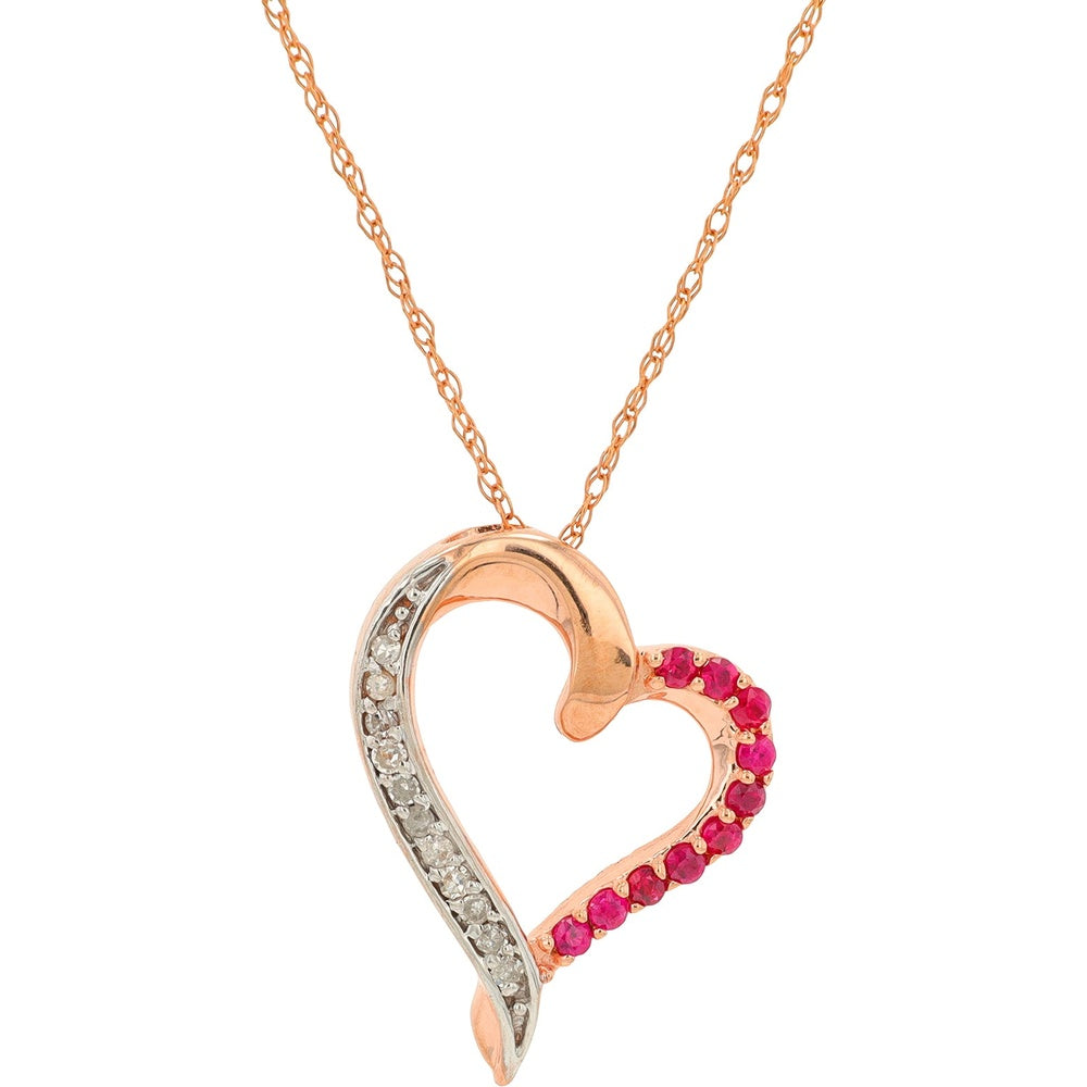 10K Rose Gold Asymmetrical Heart Pendant with Round Cut Rubies and Diamond Accents - 0.60 Carat Total Ruby Weight and 0.06 Carat Total Diamond Weight