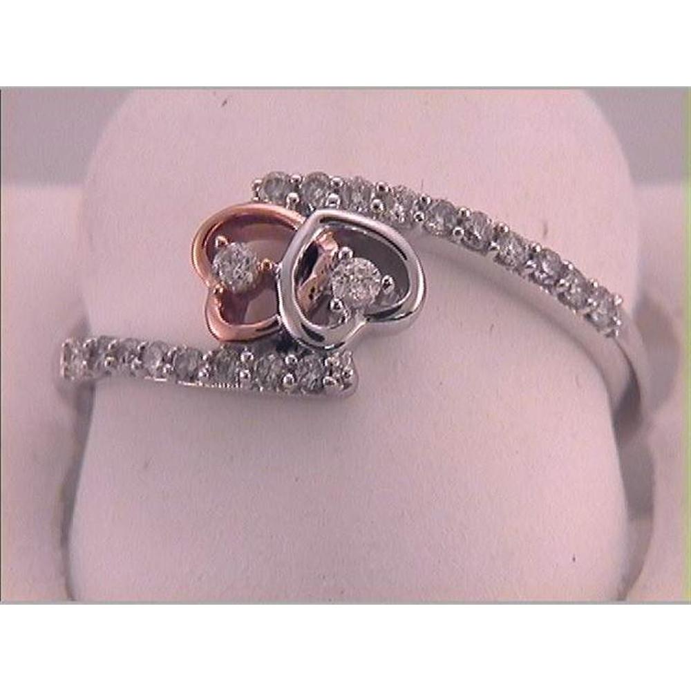 10K Two-Tone Gold Bypass Ring with Interlocking Heart Motifs and Prong-Set Diamonds - 0.20 Carat Total Diamond Weight