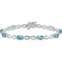 10K White Gold Blue Topaz and Diamond Infinity Bracelet - 7in Length by Oro Pregiato