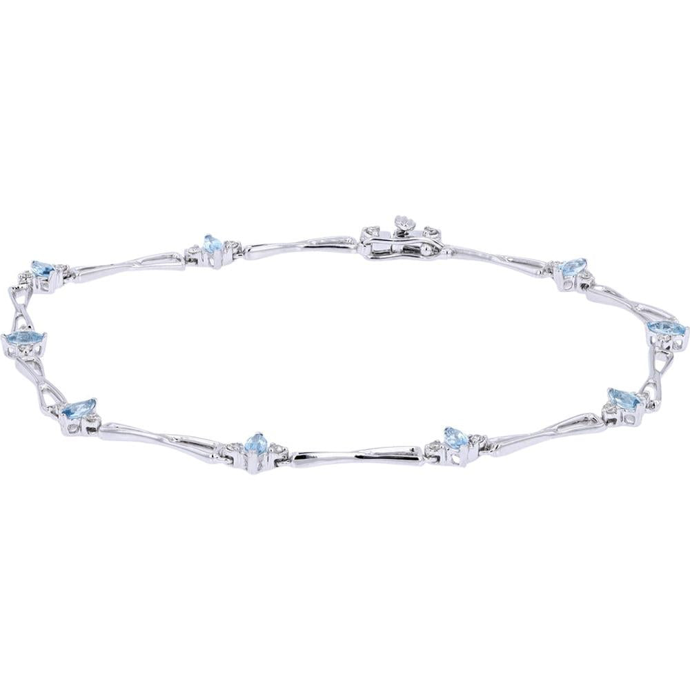 10K White Gold Blue Topaz and Diamond Tennis Bracelet - 0.80 Carats Blue Topaz, 0.20 Carats Total Diamond Weight