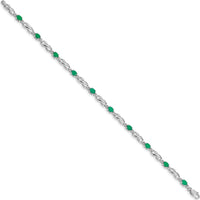 10K White Gold Cable Link Bracelet with Oval Emeralds and Round Diamonds - 0.22 Carats Total Emerald Weight, 0.005 Carats Total Diamond Weight by Monteluci Fine Jewelry