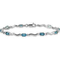 10K White Gold Fancy Diamond and Blue Topaz Bracelet with Oval Swiss Blue Topaz - 0.3 Carats Total Gem Weight by Oro Pregiato