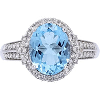 10K White Gold Halo Ring with Oval Swiss Blue Topaz and Pavé-Set Round Diamonds - 3.00 Carat Total Topaz Weight and 0.36 Carat Total Diamond Weight