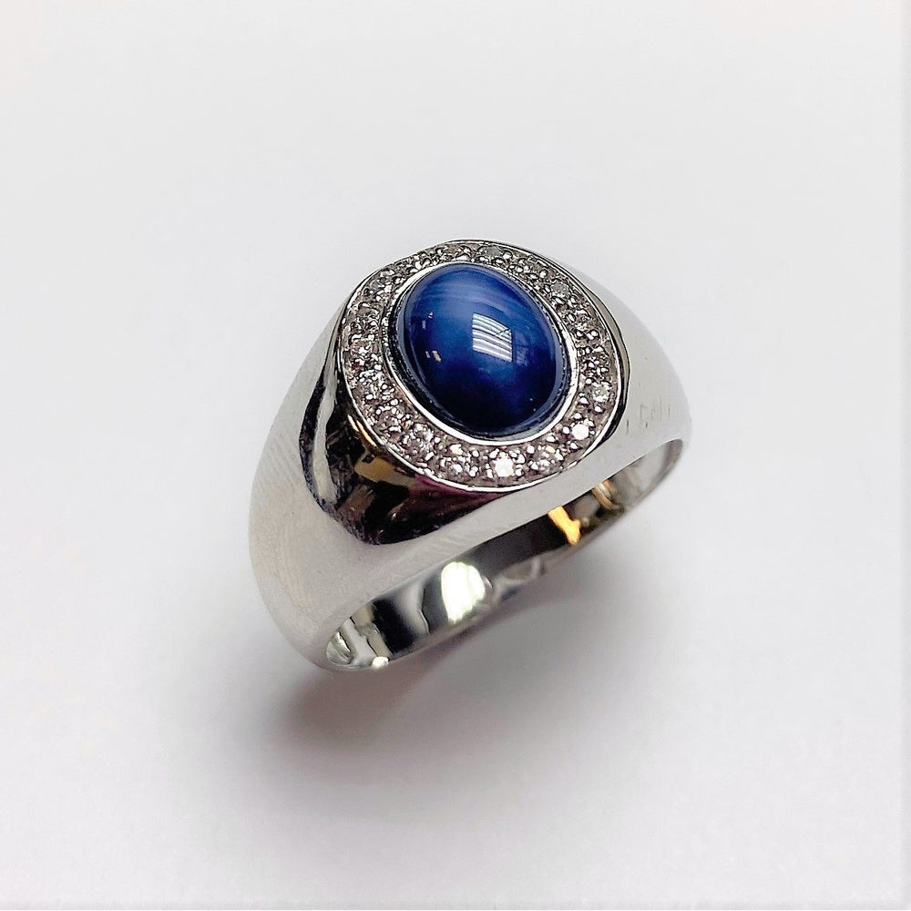 10K White Gold Men's Statement Ring with Oval Cabochon Sapphire and Milgrain Set Round Diamonds - 0.14 Carat Total Diamond Weight by Auriventus