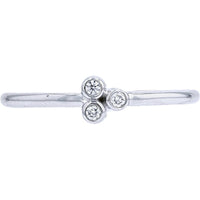 10K White Gold Three Stone Ring with 0.05 Carat Total Bezel Set Round Diamonds