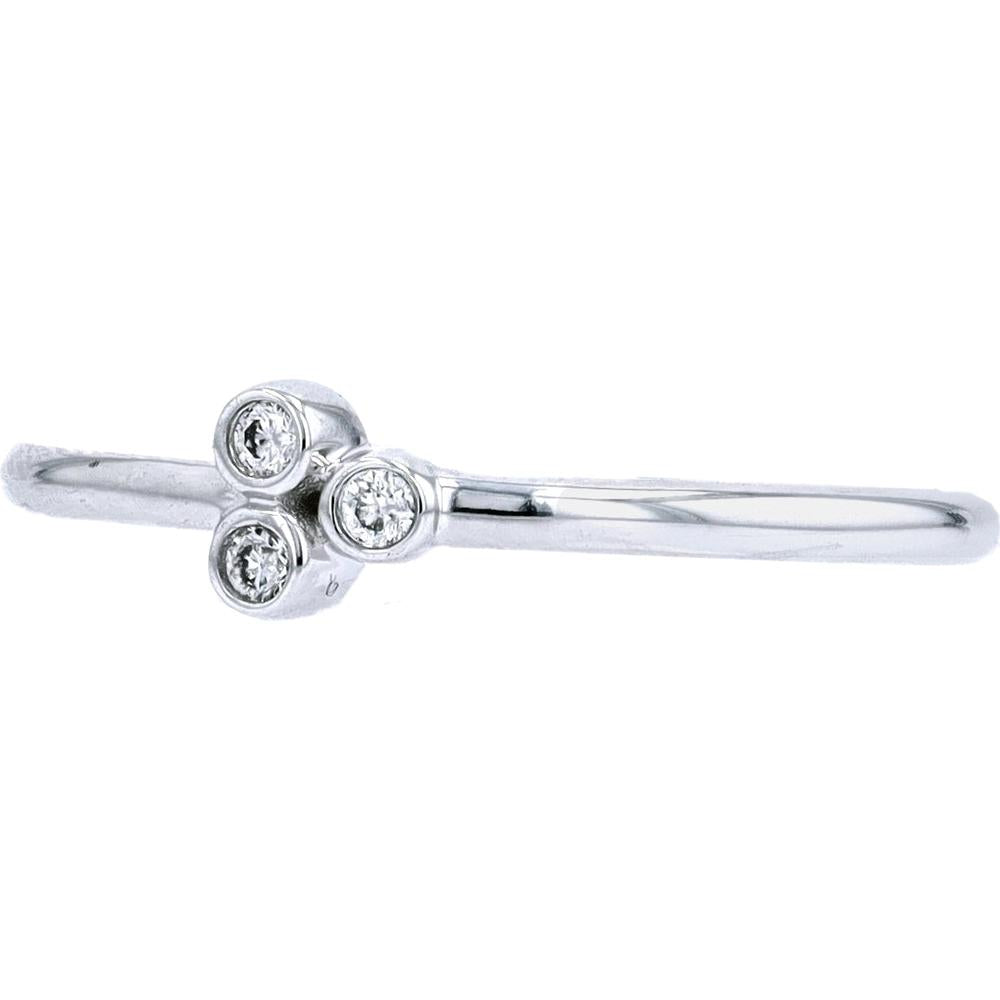 10K White Gold Three Stone Ring with 0.05 Carat Total Bezel Set Round Diamonds