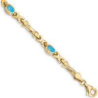 10K Yellow Gold Bracelet with 4 Oval Swiss Blue Topaz Stones - 0.56 Carats Total Gem Weight by Oro Pregiato