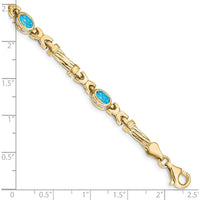10K Yellow Gold Bracelet with 4 Oval Swiss Blue Topaz Stones - 0.56 Carats Total Gem Weight by Oro Pregiato