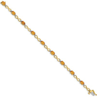 10K Yellow Gold Citrine and Diamond Infinity Bracelet with 9 Oval Citrine Stones - 0.48 Carats Total Citrine Weight, 0.025 Carats Total Diamond Weight by Monteluci Fine Jewelry