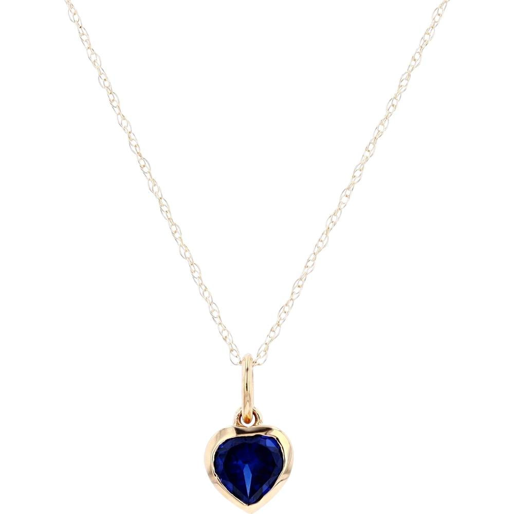 10K Yellow Gold Heart Pendant with Created Sapphire - 0.45 Carat Total Gemstone Weight