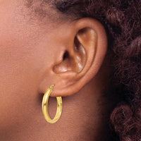 10K Yellow Gold Round Tube Hoop Earrings - Polished Finish - 21mm Length