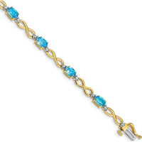 10K Yellow Gold Swiss Blue Topaz and Diamond Infinity Bracelet - 0.56 Carats Total Topaz Weight by Monteluci Fine Jewelry