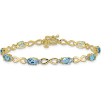 10K Yellow Gold Swiss Blue Topaz and Diamond Infinity Bracelet - 0.56 Carats Total Topaz Weight by Monteluci Fine Jewelry