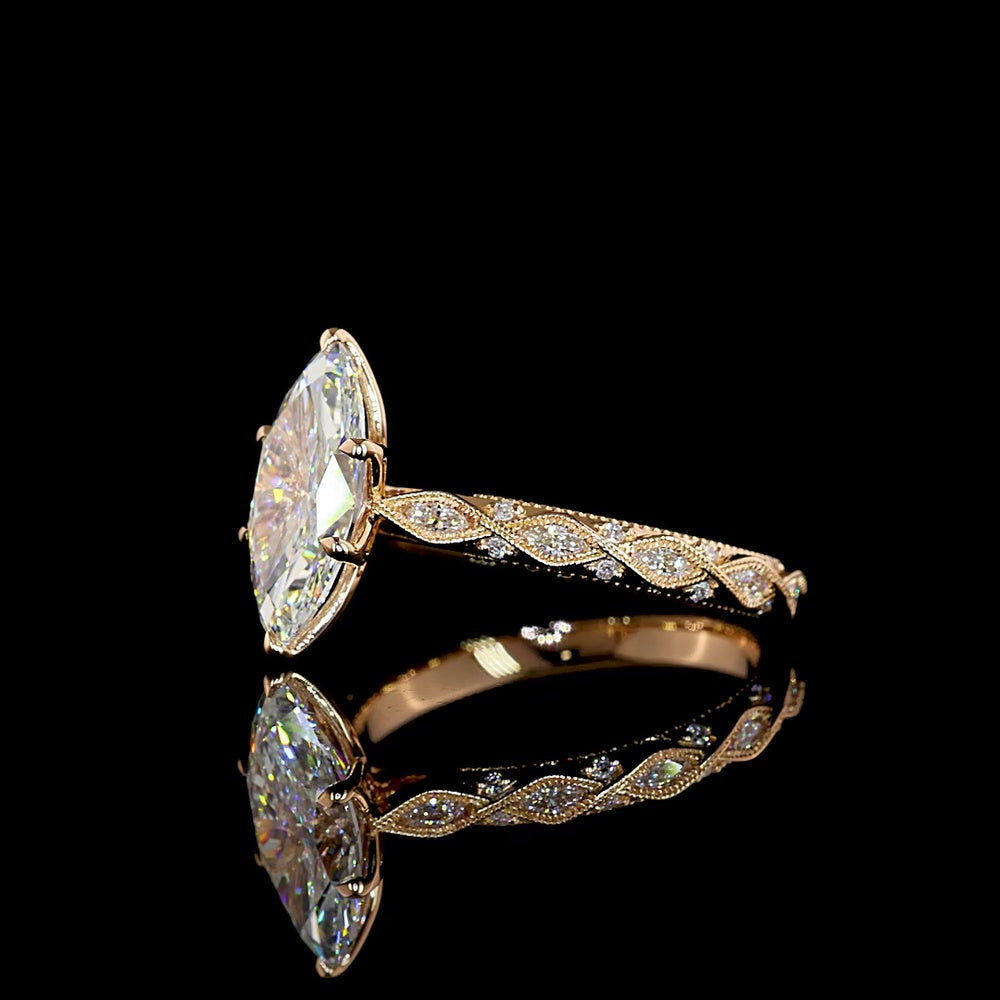 14K Rose Gold Marquise Cut Lab Diamond Twisted Shank Ring with Accent Marquise and Round Diamonds - 2.25 Carat Total Weight - Covaloro Fine Jewelry