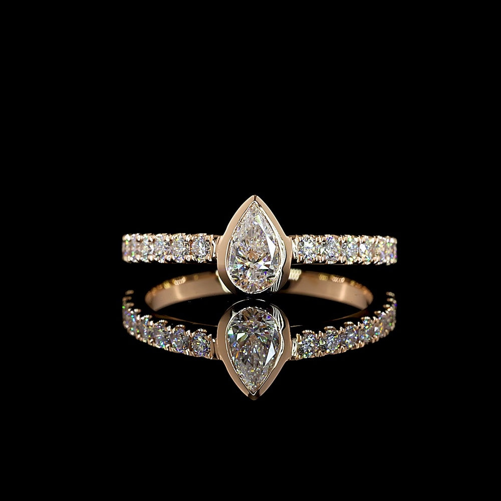 14K Rose Gold Pear Shape Solitaire Lab Diamond Ring with Bezel and Prong Set Brilliant Cut Accent Diamonds - 0.66 Carat Total Diamond Weight - Covaloro Fine Jewelry