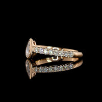 14K Rose Gold Pear Shape Solitaire Lab Diamond Ring with Bezel and Prong Set Brilliant Cut Accent Diamonds - 0.66 Carat Total Diamond Weight - Covaloro Fine Jewelry
