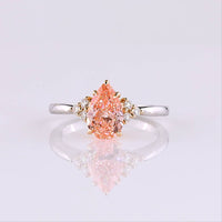 14K Two Tone 1.66 Carat Pear Shape Lab Grown Diamond Ring with Fancy Vivid Pink Center and Brilliant Cut Accents - Covaloro Fine Jewelry
