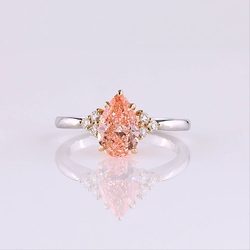 14K Two Tone 1.66 Carat Pear Shape Lab Grown Diamond Ring with Fancy Vivid Pink Center and Brilliant Cut Accents - Covaloro Fine Jewelry