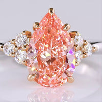 14K Two Tone 1.66 Carat Pear Shape Lab Grown Diamond Ring with Fancy Vivid Pink Center and Brilliant Cut Accents - Covaloro Fine Jewelry