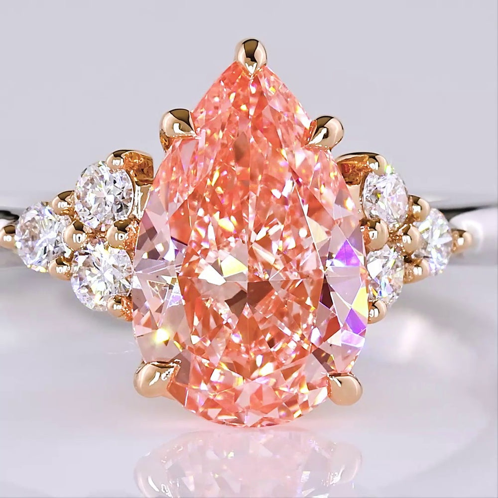 14K Two Tone 1.66 Carat Pear Shape Lab Grown Diamond Ring with Fancy Vivid Pink Center and Brilliant Cut Accents - Covaloro Fine Jewelry