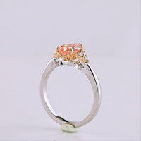 14K Two Tone 1.66 Carat Pear Shape Lab Grown Diamond Ring with Fancy Vivid Pink Center and Brilliant Cut Accents - Covaloro Fine Jewelry