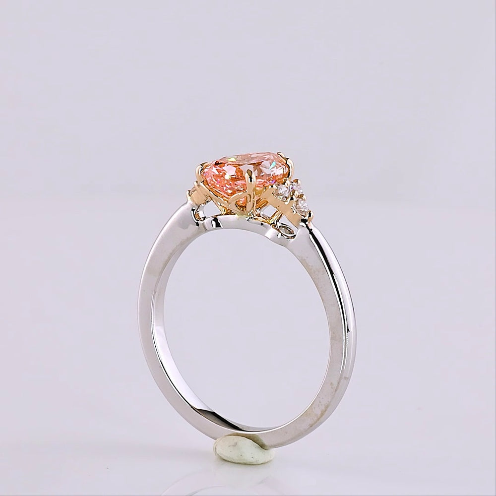 14K Two Tone 1.66 Carat Pear Shape Lab Grown Diamond Ring with Fancy Vivid Pink Center and Brilliant Cut Accents - Covaloro Fine Jewelry