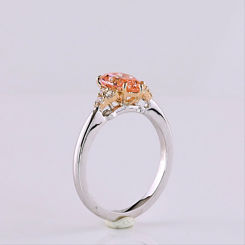 14K Two Tone 1.66 Carat Pear Shape Lab Grown Diamond Ring with Fancy Vivid Pink Center and Brilliant Cut Accents - Covaloro Fine Jewelry