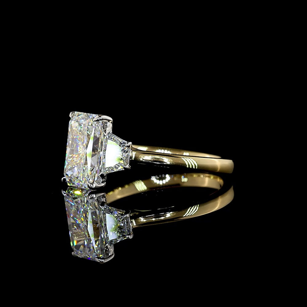 14K Two Tone 3 Stone Ring with 2.54 Carat Radiant Cut Lab Diamond and 0.63 Carat Trapezoid Side Stones - 3.17 Total Carat Weight - Covaloro Fine Jewelry