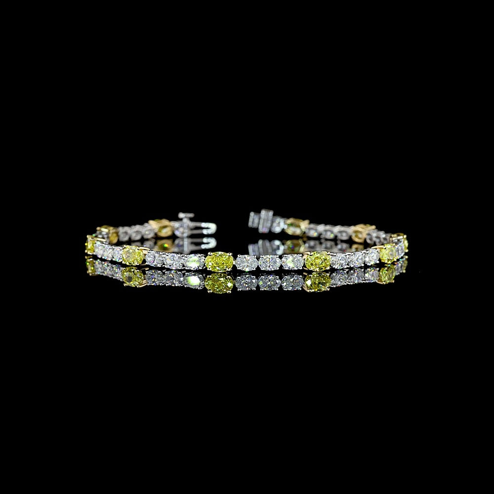 14K Two Tone East-West Oval Cut Tennis Bracelet with Fancy Vivid Yellow and White Lab-Grown Diamonds - 7.56 Carats Total Diamond Weight - Covaloro Fine Jewelry