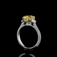 14K Two Tone Hidden Halo Ring with 2.51 Carat Oval Fancy Vivid Yellow Lab Diamond and Half-Moon Accent Diamonds - 3.63 Carat Total Weight - Covaloro Fine Jewelry