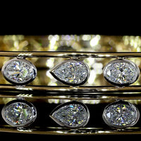 14K Two Tone Mixed Shape Bangle Bracelet with Bezel Set Oval, Emerald, Pear, and Round Lab Diamonds - 2.64 Carat Total Weight - Covaloro Fine Jewelry