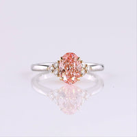 14K Two Tone Oval Cut Fancy Vivid Pink Lab Diamond Ring with Brilliant White Accent Diamonds - 1.65 Carat Total Weight (IGI Certified) - Covaloro Fine Jewelry