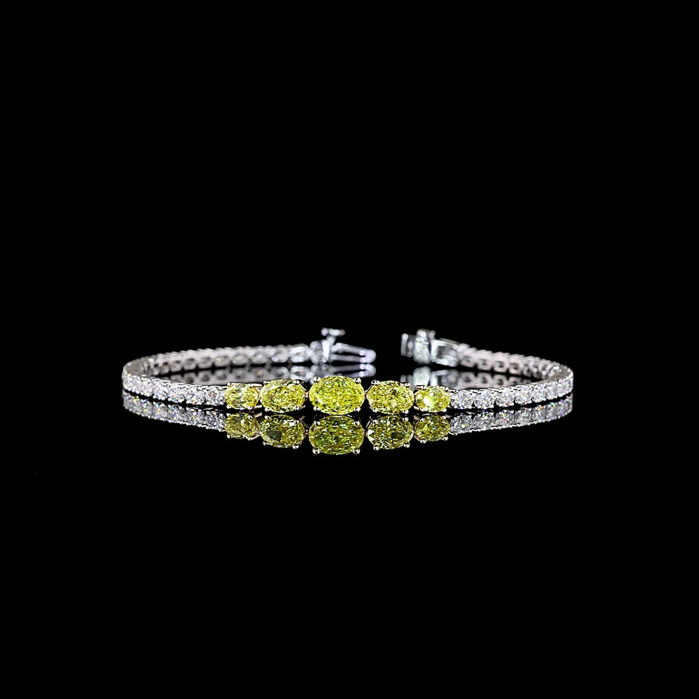 14K Two Tone Riviera Bracelet with East-West Oval Cut Fancy Vivid Yellow Lab Diamonds and E Color White Diamond Accents - 5.62 Total Carat Weight - Covaloro Fine Jewelry