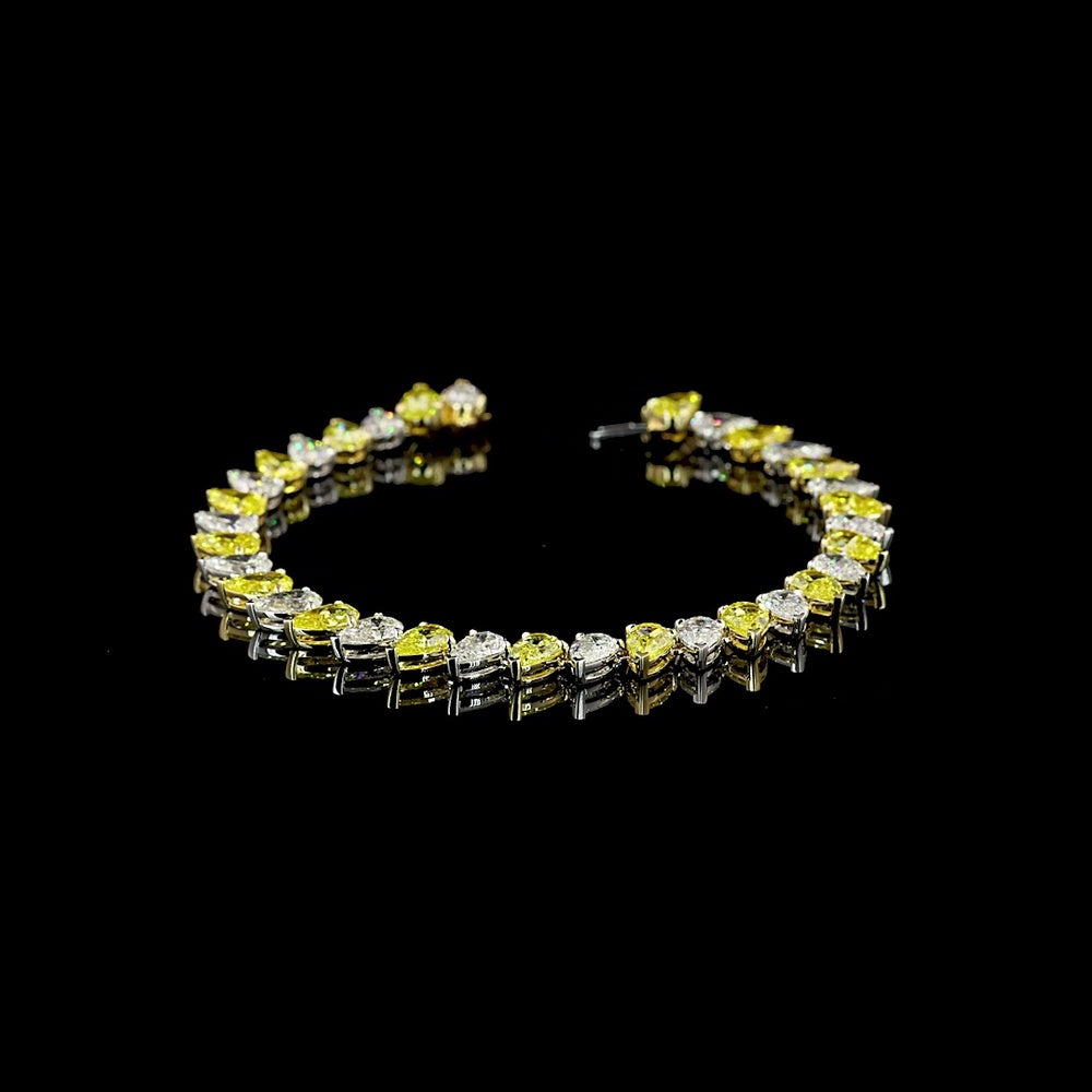 14K Two Tone Tennis Bracelet with Alternating Pear Shape Fancy Yellow and White Diamonds - 17.27 Carat Total Weight - Covaloro Fine Jewelry
