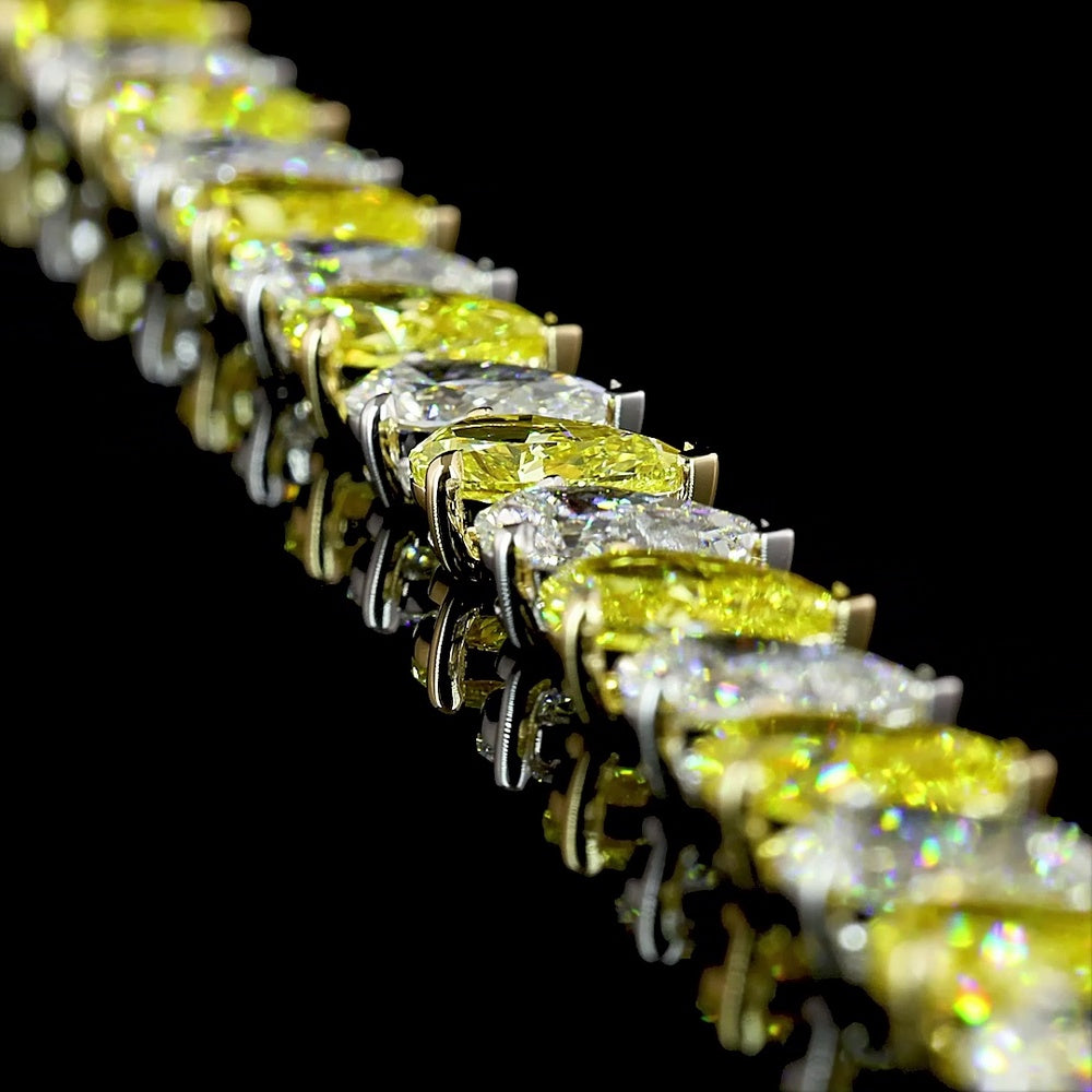 14K Two Tone Tennis Bracelet with Alternating Pear Shape Fancy Yellow and White Diamonds - 17.27 Carat Total Weight - Covaloro Fine Jewelry