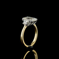 14K Two Tone Three Stone Ring with 3.05 Carat Emerald Cut Lab Diamond and 0.71 Carat Trapezoid Side Stones - 3.76 Carat Total Diamond Weight, IGI Certified E VVS2 - Covaloro Fine Jewelry