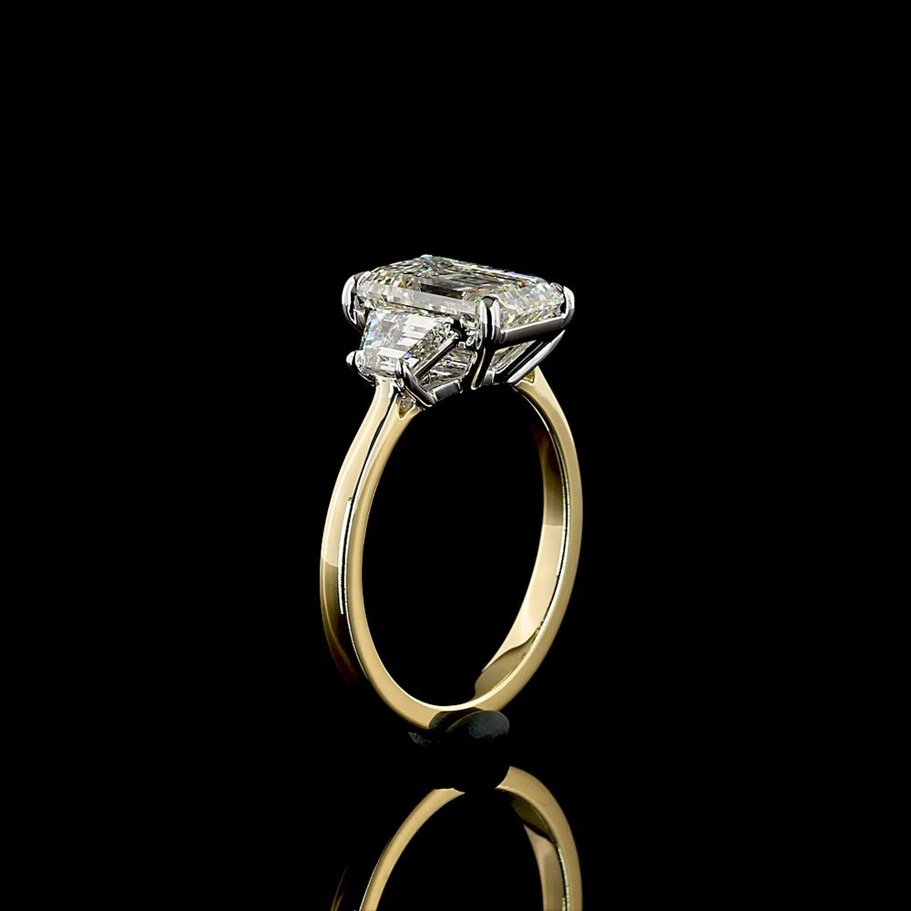 14K Two Tone Three Stone Ring with 3.05 Carat Emerald Cut Lab Diamond and 0.71 Carat Trapezoid Side Stones - 3.76 Carat Total Diamond Weight, IGI Certified E VVS2 - Covaloro Fine Jewelry