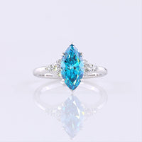 14K White Gold 1.84 Carats Total Weight Marquise Cut Fancy Vivid Blue Lab Diamond Ring with Brilliant Cut Diamond Accents - IGI Certified - Covaloro Fine Jewelry