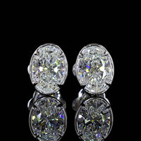 14K White Gold 2.01 Carat Oval Lab Diamond Stud Earrings in Bezel-Prong Setting with E-F Color and VS1 Clarity - Covaloro Fine Jewelry