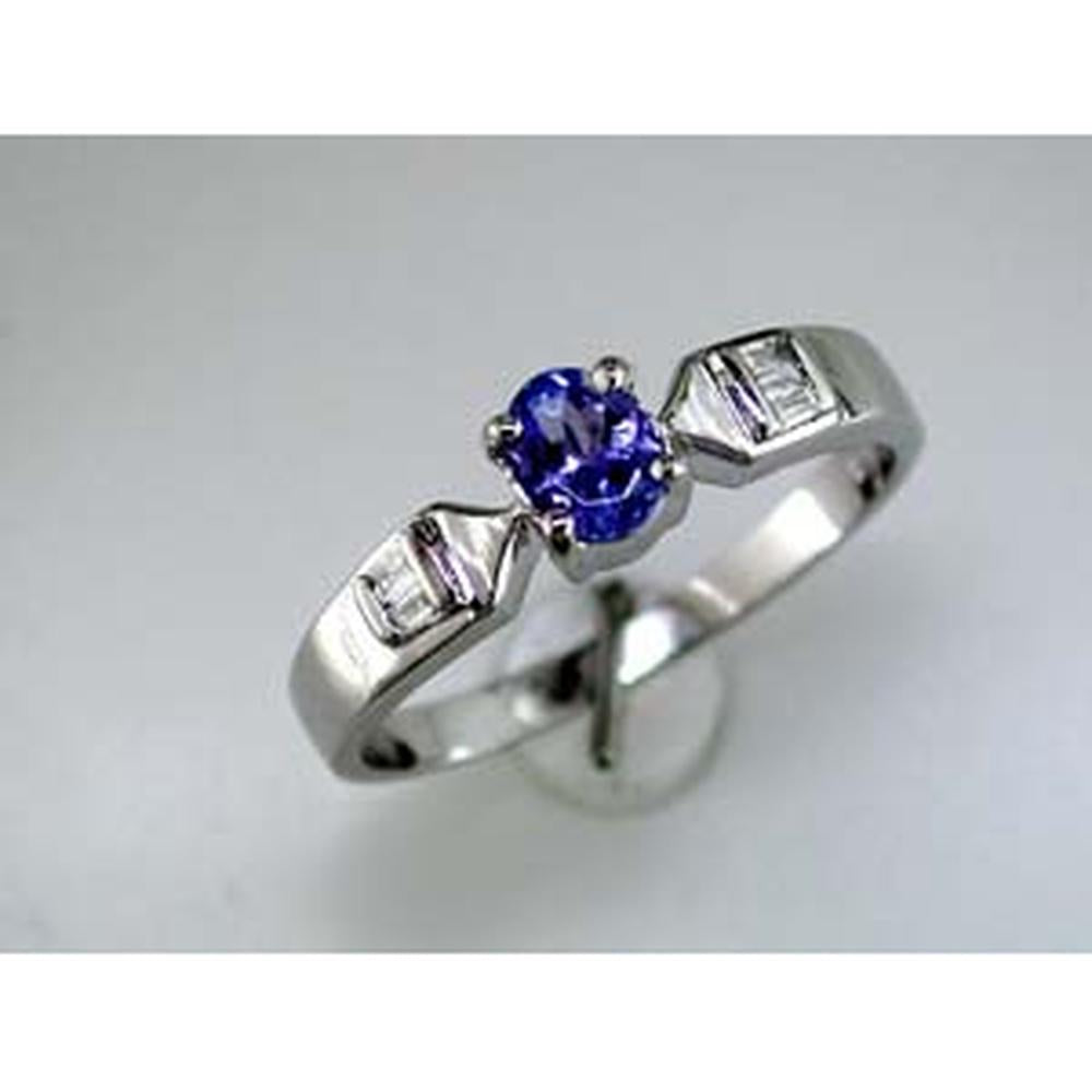 14K White Gold 3-Stone Ring with 0.35 Carat Oval Tanzanite and Channel-Set Baguette Diamonds - 0.43 Carat Total Gem Weight - Royal Jewelry
