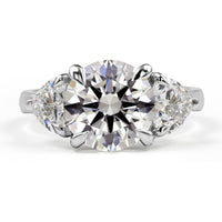 14K White Gold 3-Stone Ring with 3.00 Carats Round Brilliant Lab Diamond and 1.12 Carats Heart-Shape Lab Diamonds - 4.12 Carats Total Diamond Weight - Covaloro Fine Jewelry