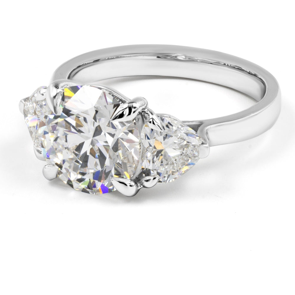 14K White Gold 3-Stone Ring with 3.00 Carats Round Brilliant Lab Diamond and 1.12 Carats Heart-Shape Lab Diamonds - 4.12 Carats Total Diamond Weight - Covaloro Fine Jewelry