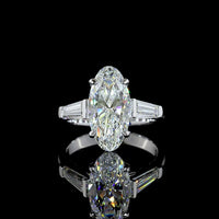 14K White Gold 3 Stone Ring with 3.06 Carat Moval Cut Lab Diamond and 0.96 Carat Tapered Baguette Lab Diamonds - 4.02 Carat Total Diamond Weight - Covaloro Fine Jewelry