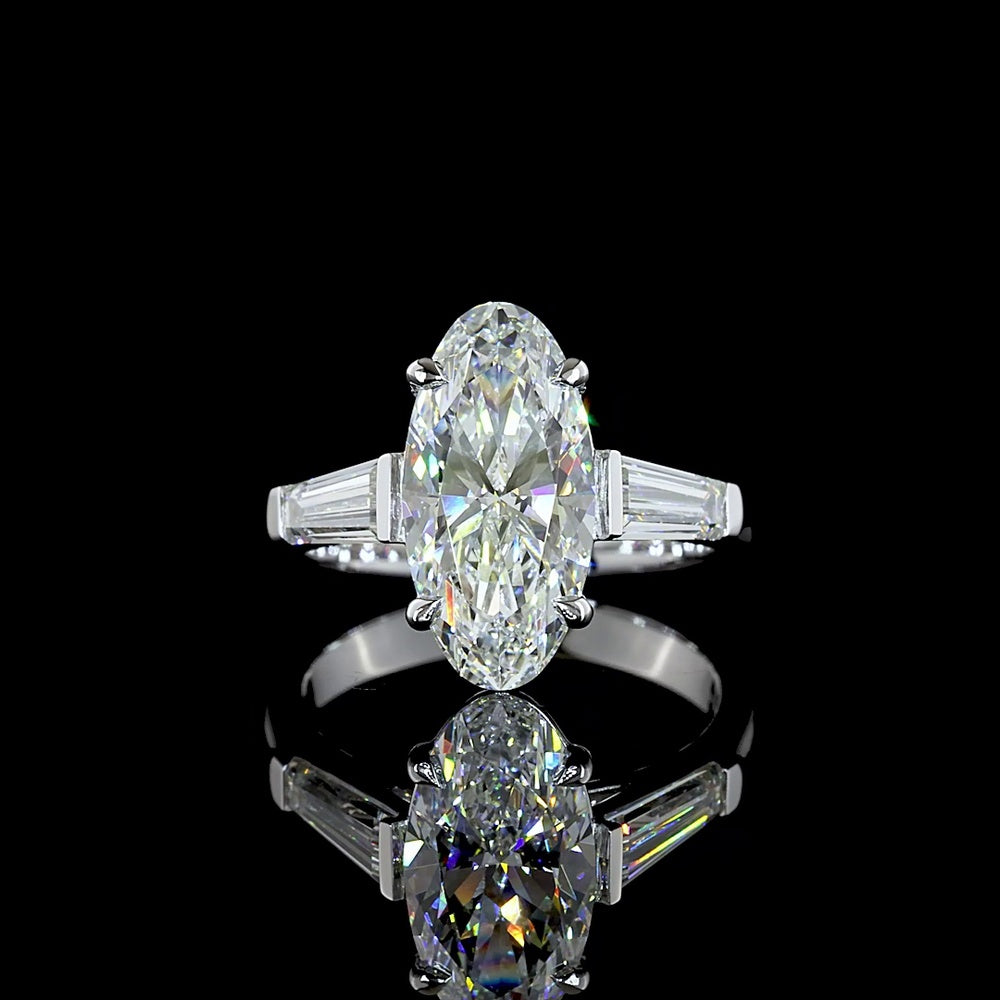 14K White Gold 3 Stone Ring with 3.06 Carat Moval Cut Lab Diamond and 0.96 Carat Tapered Baguette Lab Diamonds - 4.02 Carat Total Diamond Weight - Covaloro Fine Jewelry