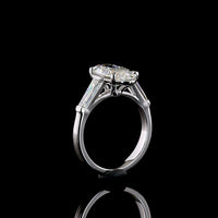 14K White Gold 3 Stone Ring with 3.06 Carat Moval Cut Lab Diamond and 0.96 Carat Tapered Baguette Lab Diamonds - 4.02 Carat Total Diamond Weight - Covaloro Fine Jewelry