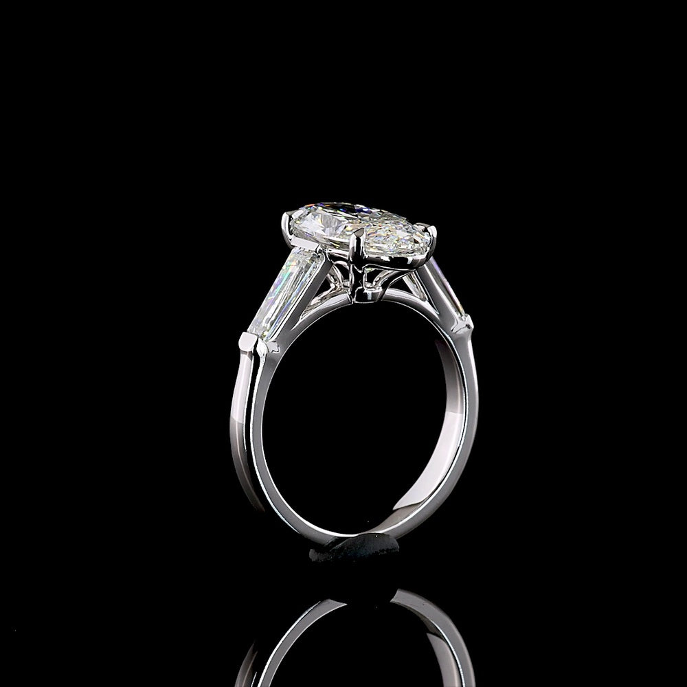 14K White Gold 3 Stone Ring with 3.06 Carat Moval Cut Lab Diamond and 0.96 Carat Tapered Baguette Lab Diamonds - 4.02 Carat Total Diamond Weight - Covaloro Fine Jewelry