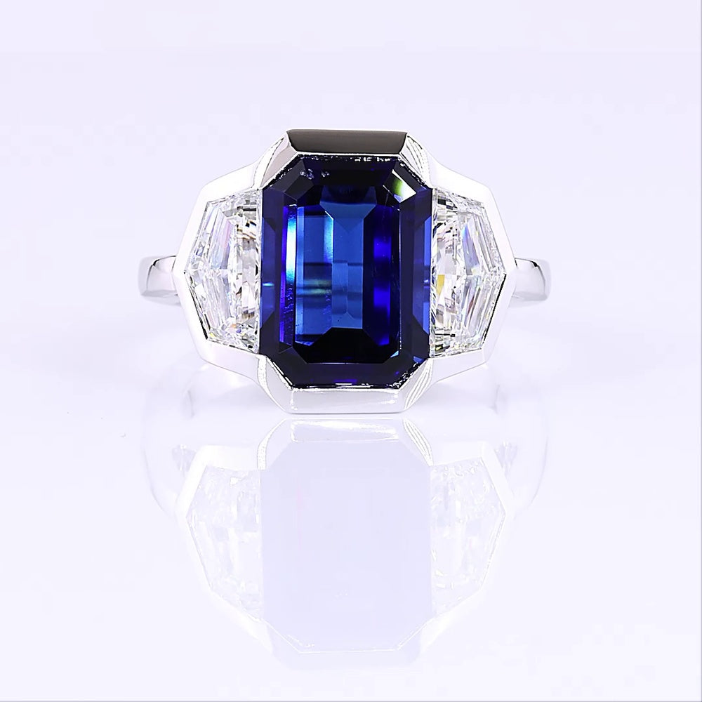 14K White Gold 3-Stone Ring with 6.48 Carats Emerald Cut Lab Blue Sapphire and 1.84 Carats Emerald Cut Lab Diamonds in Half-Bezel Setting - 8.32 Carats Total Gem Weight - Covaloro Fine Jewelry